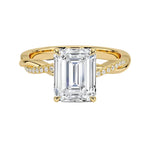 Emerald cut Moissanite lab grown diamond engagement ring with twisted single pave set gold shank, against a white background.Moissanite engagement ring cape town south africa grand diamonds ralph jacobs jeulia 
