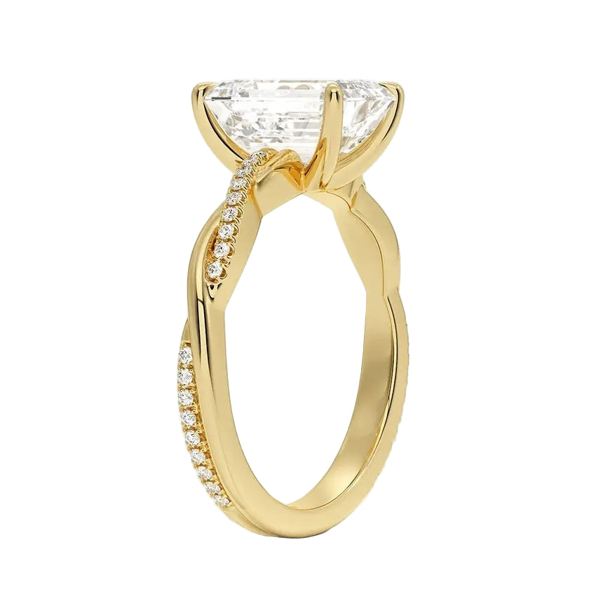 Emerald cut Moissanite lab grown diamond engagement ring with twisted single pave set gold shank, against a white background.Moissanite engagement ring cape town south africa grand diamonds ralph jacobs jeulia