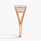 Emerald cut Moissanite lab grown diamond engagement ring round shank with a four claw setting, on a gold band, against a white background.Moissanite engagement ring cape town south africa grand diamonds ralph jacobs jeulia 