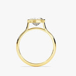  Heart shape Moissanite lab grown diamond engagement ring round shank with a bezel setting, on a gold band, against a white background.Moissanite engagement ring cape town south africa grand diamonds ralph jacobs jeulia "