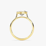  Heart shape Moissanite lab grown diamond engagement ring round shank with a bezel setting, on a gold band, against a white background.Moissanite engagement ring cape town south africa grand diamonds ralph jacobs jeulia "
