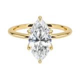 Marquise cut Moissanite lab grown diamond engagement ring round shank with six cat claw setting, on a gold band, against a white background.Moissanite engagement ring cape town south africa grand diamonds ralph jacobs jeulia 