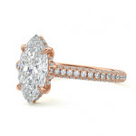 Marquise cut Moissanite lab grown diamond engagement ring with three row micro pave set gold shank, hidden double halo four cat claw against a white background.Moissanite engagement ring cape town south africa grand diamonds ralph jacobs jeulia 