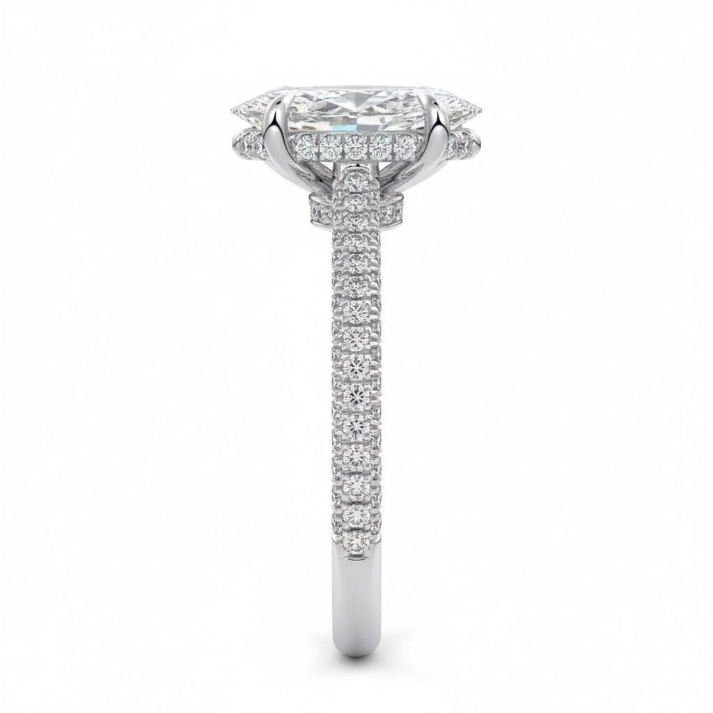 Marquise cut Moissanite lab grown diamond engagement ring with three row micro pave set gold shank, hidden double halo four cat claw against a white background.Moissanite engagement ring cape town south africa grand diamonds ralph jacobs jeulia 