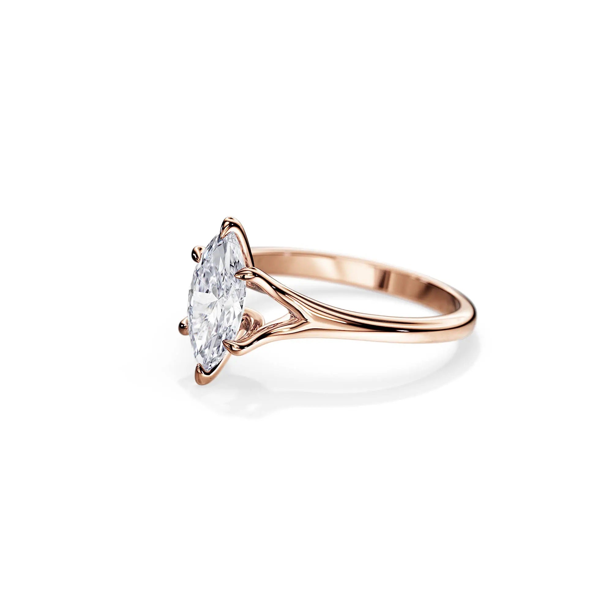 Marquise cut Moissanite lab grown diamond engagement ring v-split shank with a six claw setting, on a gold band, against a white background.Moissanite engagement ring cape town south africa grand diamonds ralph jacobs jeulia  