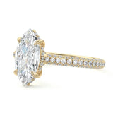 Marquise cut Moissanite lab grown diamond engagement ring with three row micro pave set gold shank, hidden double halo four cat claw against a white background.Moissanite engagement ring cape town south africa grand diamonds ralph jacobs jeulia 