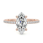 Marquise cut Moissanite lab grown diamond engagement ring round shank with four cat claw setting hidden halo and pave set shank, on a gold band, against a white background.Moissanite engagement ring cape town south africa grand diamonds ralph jacobs jeulia 