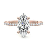 Marquise cut Moissanite lab grown diamond engagement ring round shank with four cat claw setting hidden halo and pave set shank, on a gold band, against a white background.Moissanite engagement ring cape town south africa grand diamonds ralph jacobs jeulia 