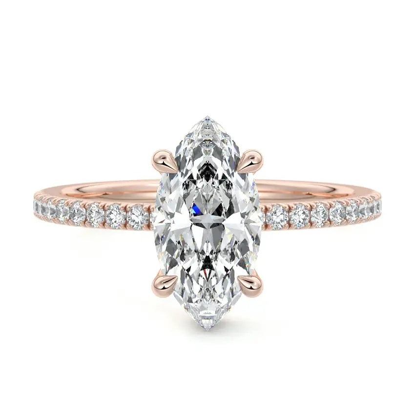 Marquise cut Moissanite lab grown diamond engagement ring round shank with four cat claw setting hidden halo and pave set shank, on a gold band, against a white background.Moissanite engagement ring cape town south africa grand diamonds ralph jacobs jeulia 