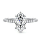 Marquise cut Moissanite lab grown diamond engagement ring round shank with four cat claw setting hidden halo and pave set shank, on a gold band, against a white background.Moissanite engagement ring cape town south africa grand diamonds ralph jacobs jeulia 