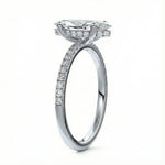 Marquise cut Moissanite lab grown diamond engagement ring round shank with four cat claw setting hidden halo and pave set shank, on a gold band, against a white background.Moissanite engagement ring cape town south africa grand diamonds ralph jacobs jeulia 