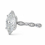 Marquise cut Moissanite lab grown diamond engagement ring half eternity fancy set shank with classic six prong setting, on a gold band, against a white background.Moissanite engagement ring cape town south africa grand diamonds ralph jacobs jeulia 