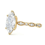 Marquise cut Moissanite lab grown diamond engagement ring half eternity fancy set shank with classic six prong setting, on a gold band, against a white background.Moissanite engagement ring cape town south africa grand diamonds ralph jacobs jeulia 