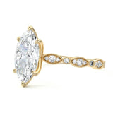 Marquise cut Moissanite lab grown diamond engagement ring half eternity fancy set shank with classic six prong setting, on a gold band, against a white background.Moissanite engagement ring cape town south africa grand diamonds ralph jacobs jeulia 