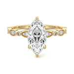 Marquise cut Moissanite lab grown diamond engagement ring half eternity fancy set shank with classic six prong setting, on a gold band, against a white background.Moissanite engagement ring cape town south africa grand diamonds ralph jacobs jeulia 