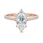 Marquise cut Moissanite lab grown diamond engagement ring pave set shank with cathedral setting, on a gold band, against a white background.Moissanite engagement ring cape town south africa grand diamonds ralph jacobs jeulia