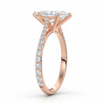 Marquise cut Moissanite lab grown diamond engagement ring pave set shank with cathedral setting, on a gold band, against a white background.Moissanite engagement ring cape town south africa grand diamonds ralph jacobs jeulia