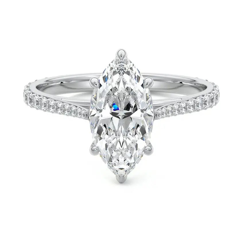 Marquise cut Moissanite lab grown diamond engagement ring pave set shank with cathedral setting, on a gold band, against a white background.Moissanite engagement ring cape town south africa grand diamonds ralph jacobs jeulia