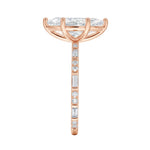 Marquise cut Moissanite lab grown diamond engagement ring with baguette and round moissanite's pave set shank with classic four prong setting, on a gold band, against a white background.Moissanite engagement ring cape town south africa grand diamonds ralph jacobs jeulia 