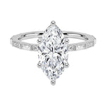 Marquise cut Moissanite lab grown diamond engagement ring with baguette and round moissanite's pave set shank with classic four prong setting, on a gold band, against a white background.Moissanite engagement ring cape town south africa grand diamonds ralph jacobs jeulia 