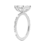 Marquise cut Moissanite lab grown diamond engagement ring with baguette and round moissanite's pave set shank with classic four prong setting, on a gold band, against a white background.Moissanite engagement ring cape town south africa grand diamonds ralph jacobs jeulia 