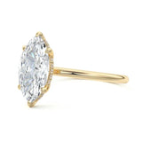 Engagement ring with marquise cut moissanite or lab grown diamond solitaire six claw  hidden halo setting yellow rose or white gold hidden halo and pave set shank Cape Town South Africa grand diamonds ralph jacobs jeuli