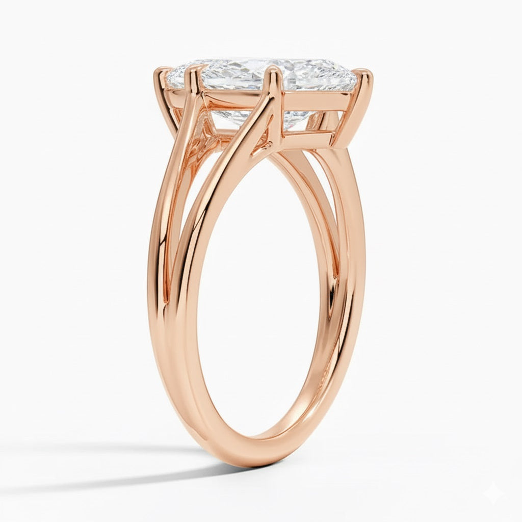 Marquise cut Moissanite lab grown diamond engagement ring V-Split shank with six cat claw setting, on a gold band, against a white background.Moissanite engagement ring cape town south africa grand diamonds ralph jacobs jeulia