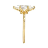 Marquise cut Moissanite lab grown diamond engagement ring round shank with six cat claw setting, on a gold band, against a white background.Moissanite engagement ring cape town south africa grand diamonds ralph jacobs jeulia