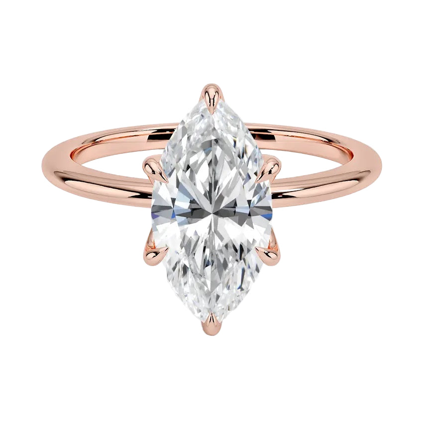 Marquise cut Moissanite lab grown diamond engagement ring round shank with six cat claw setting, on a gold band, against a white background.Moissanite engagement ring cape town south africa grand diamonds ralph jacobs jeulia