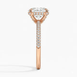 Oval cut Moissanite lab grown diamond engagement ring with three row micro pave set gold shank, hidden halo and encrusted claws against a white background.Moissanite engagement ring cape town south africa grand diamonds ralph jacobs jeulia 