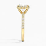 Oval cut Moissanite lab grown diamond engagement ring with three row micro pave set gold shank, hidden halo and encrusted claws against a white background.Moissanite engagement ring cape town south africa grand diamonds ralph jacobs jeulia 