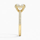 Oval cut Moissanite lab grown diamond engagement ring with three row micro pave set gold shank, hidden halo and encrusted claws against a white background.Moissanite engagement ring cape town south africa grand diamonds ralph jacobs jeulia 