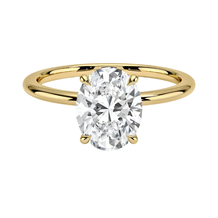 a Oval cut Moissanite lab grown diamond engagement ring round shank with a four claw setting, on a gold band, against a white background.Moissanite engagement ring cape town south africa grand diamonds ralph jacobs jeuli