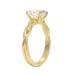 Oval cut Moissanite lab grown diamond engagement ring braided shank with a four claw setting, on a gold band, against a white background.Moissanite engagement ring cape town south africa grand diamonds ralph jacobs jeulia 