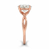 Oval cut Moissanite lab grown diamond engagement ring twisted shank with a four cat-claw setting, on a gold band, against a white background.Moissanite engagement ring cape town south africa grand diamonds ralph jacobs jeuli