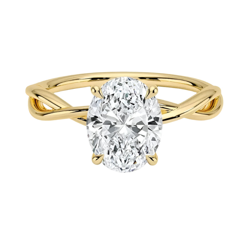 Oval cut Moissanite lab grown diamond engagement ring twisted shank with a four cat-claw setting, on a gold band, against a white background.Moissanite engagement ring cape town south africa grand diamonds ralph jacobs jeuli