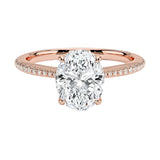 Engagement ring with oval cut moissanite or lab grown diamond solitaire four cat claw hidden halo with pave set band in yellow rose or white gold hidden double halo and pave set shank Cape Town South Africa grand diamonds ralph jacobs jeuli