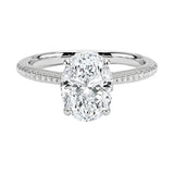 Engagement ring with oval cut moissanite or lab grown diamond solitaire four cat claw hidden halo with pave set band in yellow rose or white gold hidden double halo and pave set shank Cape Town South Africa grand diamonds ralph jacobs jeuli