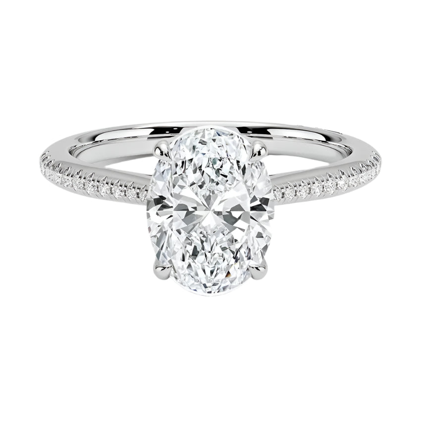 Engagement ring with oval cut moissanite or lab grown diamond solitaire four cat claw hidden halo with pave set band in yellow rose or white gold hidden double halo and pave set shank Cape Town South Africa grand diamonds ralph jacobs jeuli