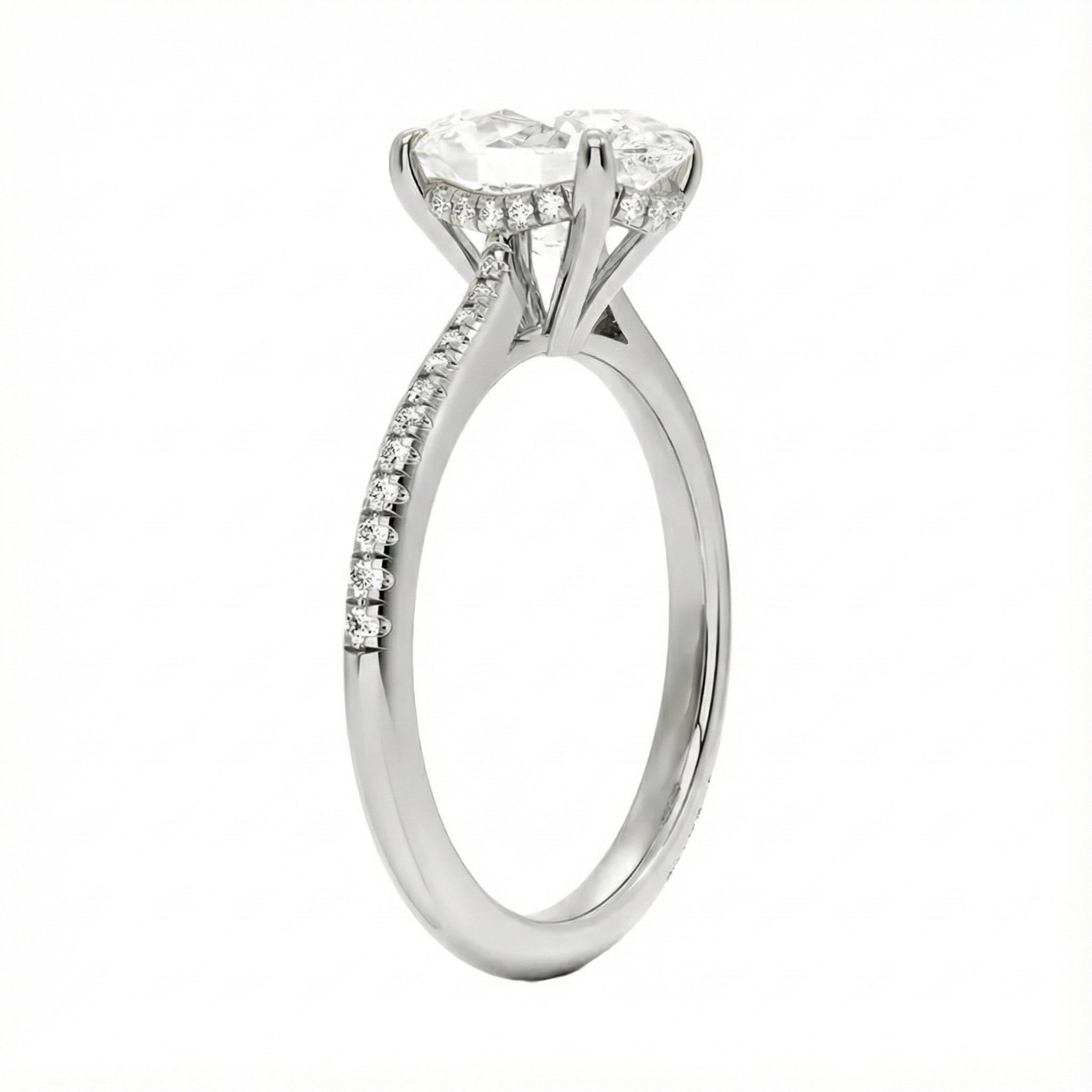 Engagement ring with oval cut moissanite or lab grown diamond solitaire four cat claw hidden halo with pave set band in yellow rose or white gold hidden double halo and pave set shank Cape Town South Africa grand diamonds ralph jacobs jeuli