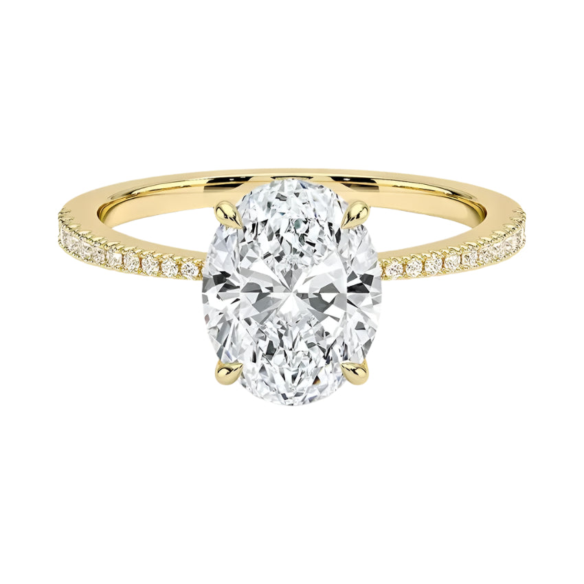 Oval cut Moissanite lab grown diamond engagement ring with tapered pave set shank on a gold band, against a white background.Moissanite engagement ring cape town south africa grand diamonds ralph jacobs jeulia 