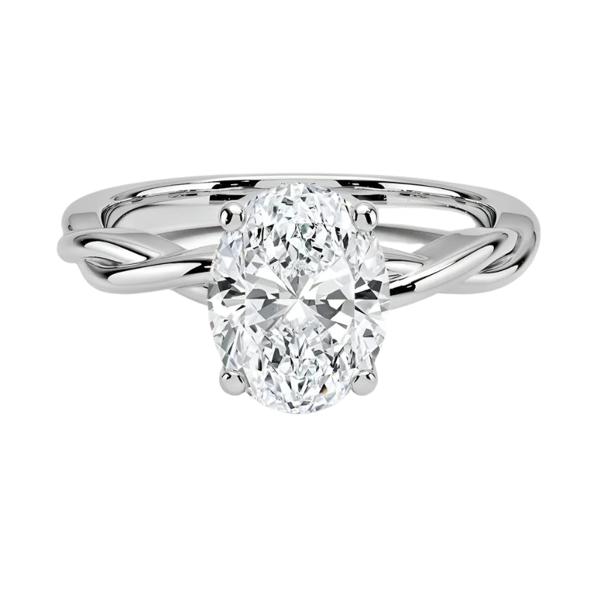 Oval cut Moissanite lab grown diamond engagement ring braided shank with a four claw setting, on a gold band, against a white background.Moissanite engagement ring cape town south africa grand diamonds ralph jacobs jeulia 