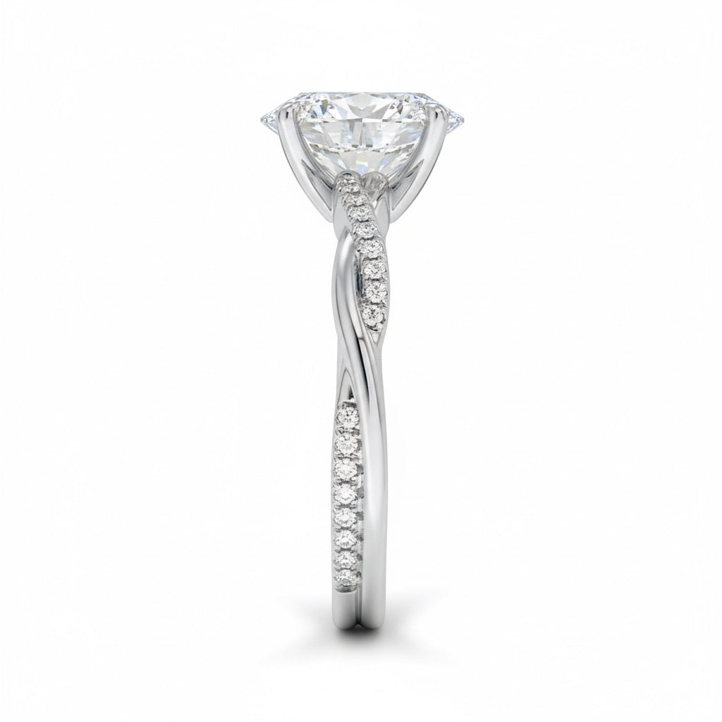 Oval cut Moissanite lab grown diamond engagement ring with twisted single pave set gold shank, against a white background.Moissanite engagement ring cape town south africa grand diamonds ralph jacobs jeulia 