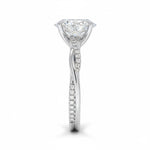 Oval cut Moissanite lab grown diamond engagement ring with twisted single pave set gold shank, against a white background.Moissanite engagement ring cape town south africa grand diamonds ralph jacobs jeulia 