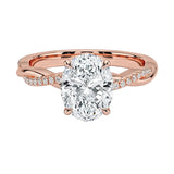 Oval cut Moissanite lab grown diamond engagement ring with twisted single pave set gold shank, against a white background.Moissanite engagement ring cape town south africa grand diamonds ralph jacobs jeulia 