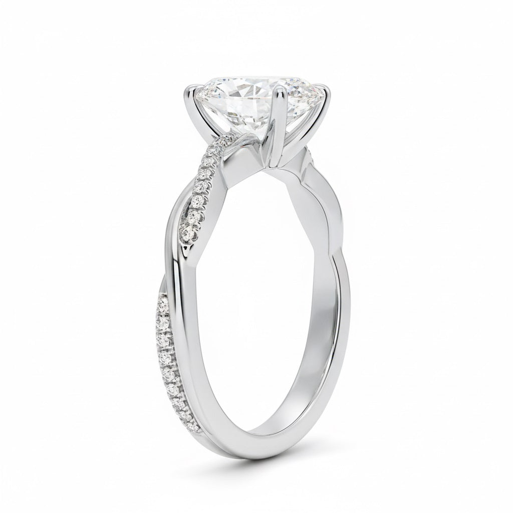 Oval cut Moissanite lab grown diamond engagement ring with twisted single pave set gold shank, against a white background.Moissanite engagement ring cape town south africa grand diamonds ralph jacobs jeulia 