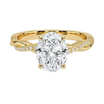 Oval cut Moissanite lab grown diamond engagement ring with twisted single pave set gold shank, against a white background.Moissanite engagement ring cape town south africa grand diamonds ralph jacobs jeulia 