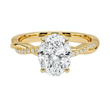 Oval cut Moissanite lab grown diamond engagement ring with twisted single pave set gold shank, against a white background.Moissanite engagement ring cape town south africa grand diamonds ralph jacobs jeulia 