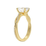 Oval cut Moissanite lab grown diamond engagement ring with twisted single pave set gold shank, against a white background.Moissanite engagement ring cape town south africa grand diamonds ralph jacobs jeulia 