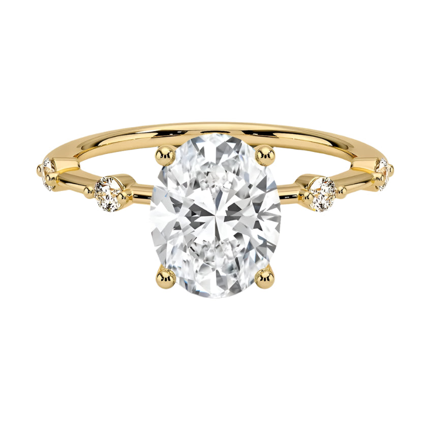 Oval cut Moissanite lab grown diamond engagement ring with tube set small round moissanites on the shank, on a gold band, against a white background.Moissanite engagement ring cape town south africa grand diamonds ralph jacobs jeulia 